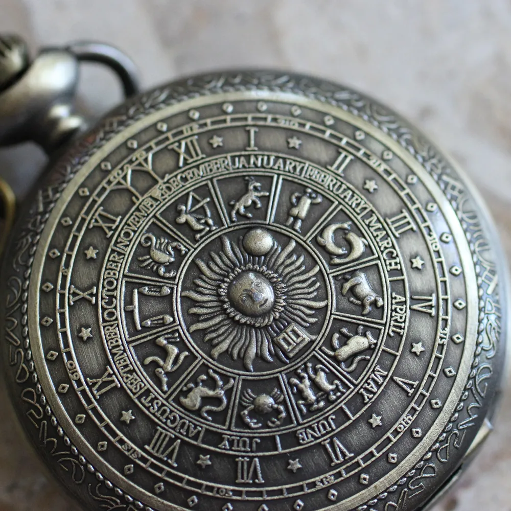 Bronzen horlogeketting – vintage kalender